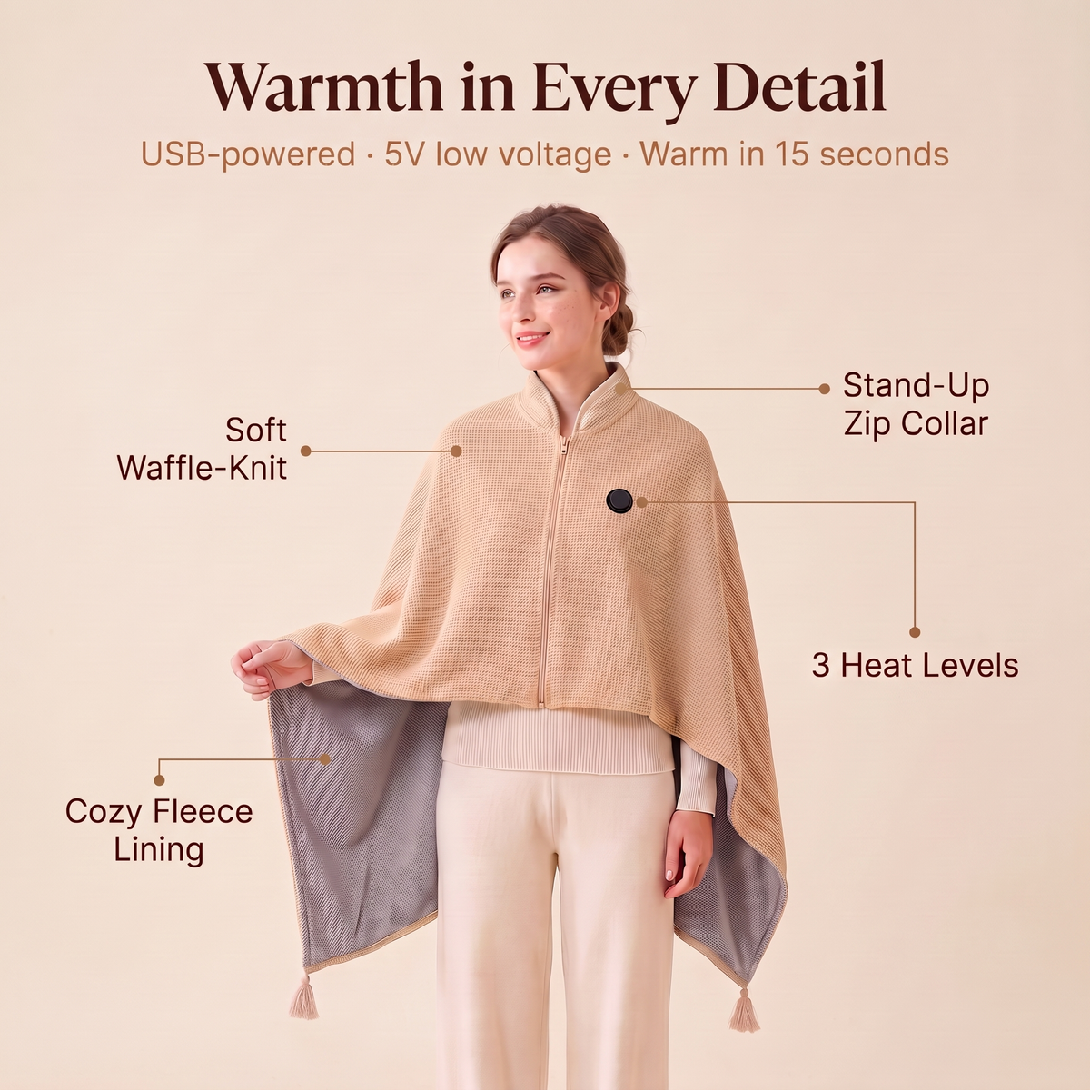Woman wearing the Hugmora heated wrap in beige, showing the waffle-knit exterior, fleece lining, zip collar and heat button
